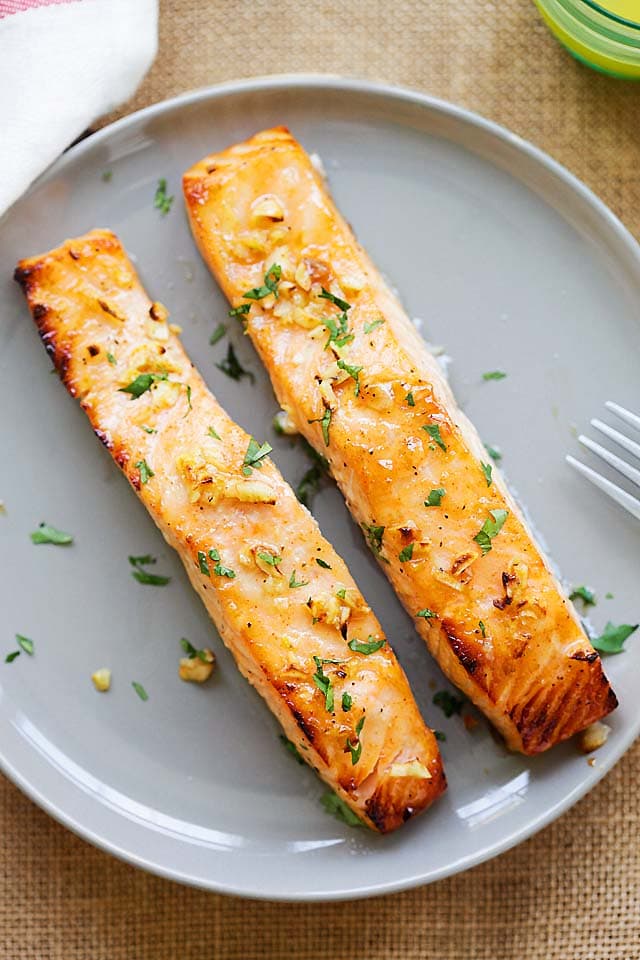 Oven baked salmon served on a plate.
