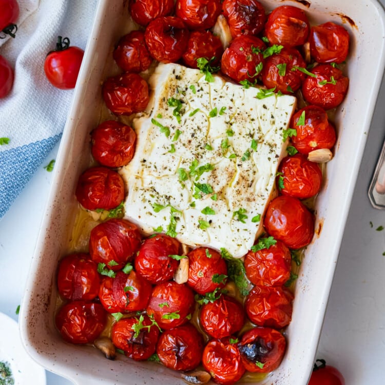 Baked tomato and feta in a baking dish.