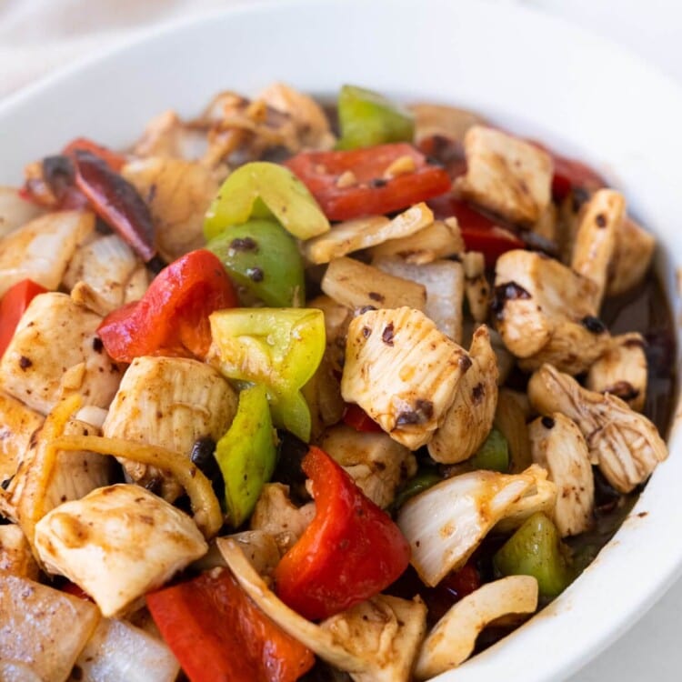 Black bean sauce chicken with red and green bell peppers.