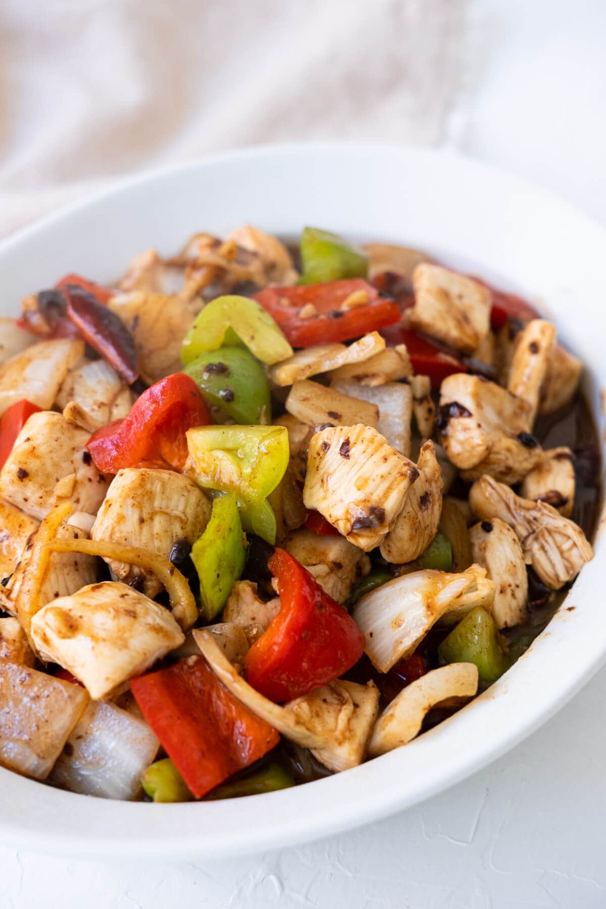 Black bean sauce chicken with red and green bell peppers.