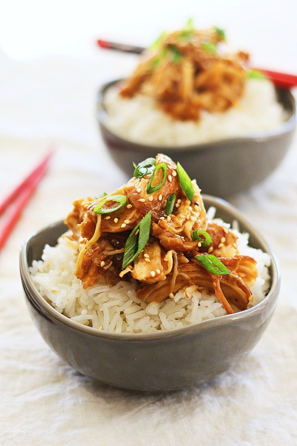 Slow cooked chicken with sweet, savory, and delicious honey teriyaki sauce on top of rice.