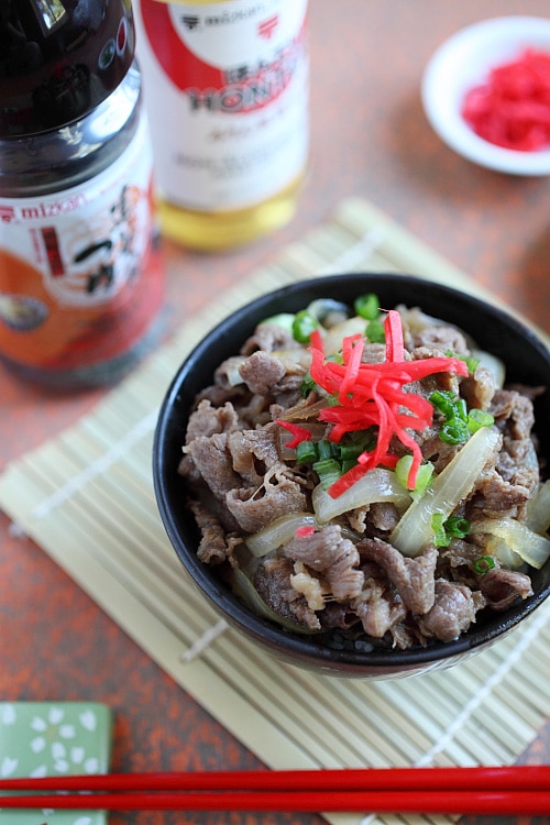 Japanese Beef Bowl Gyudon simmered beef with onion, soy sauce and rice in bowl.