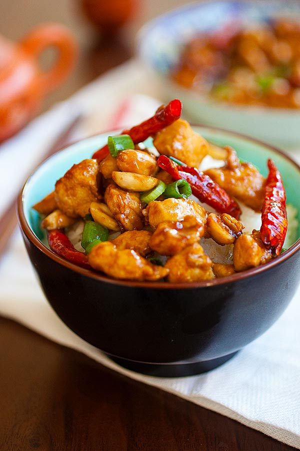Kung Pao Chicken with spicy chicken, peanuts, vegetables in a homemade brown Kung Pao sauce in a bowl.