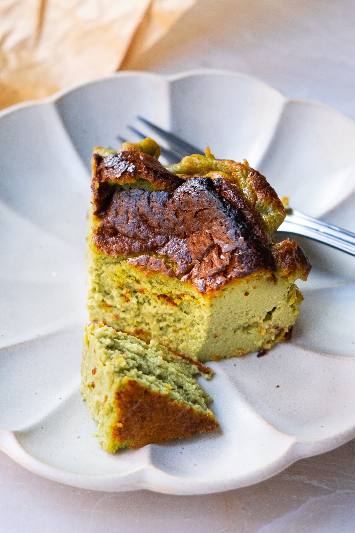 A slice of Matcha Basque cheesecake. 