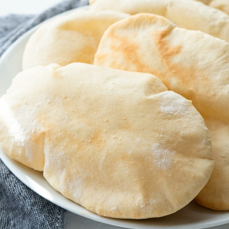 Puffy and soft pita bread. with a slightly browned crust.