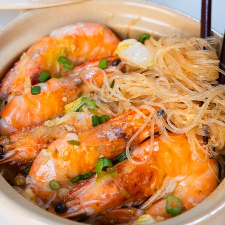Shrimp and glass noodles in a clay pot.